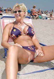 Huge boobs and string bikini mature woman.