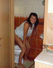 Sexy naked wife on toilet