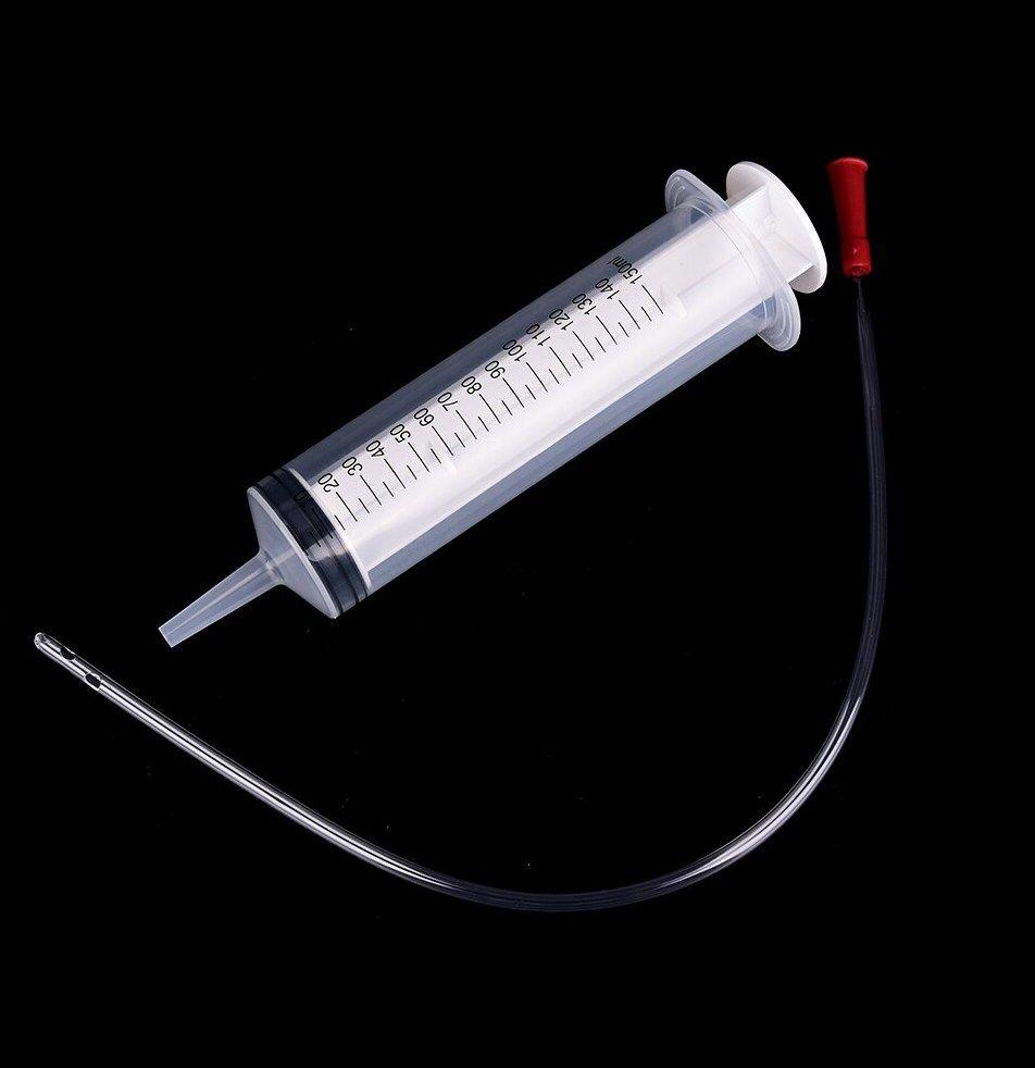Prostate milking with syringe vacuum plug