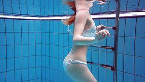 Redhead stripping underwater