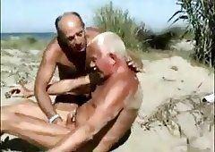 Butt twins handjob penis on beach