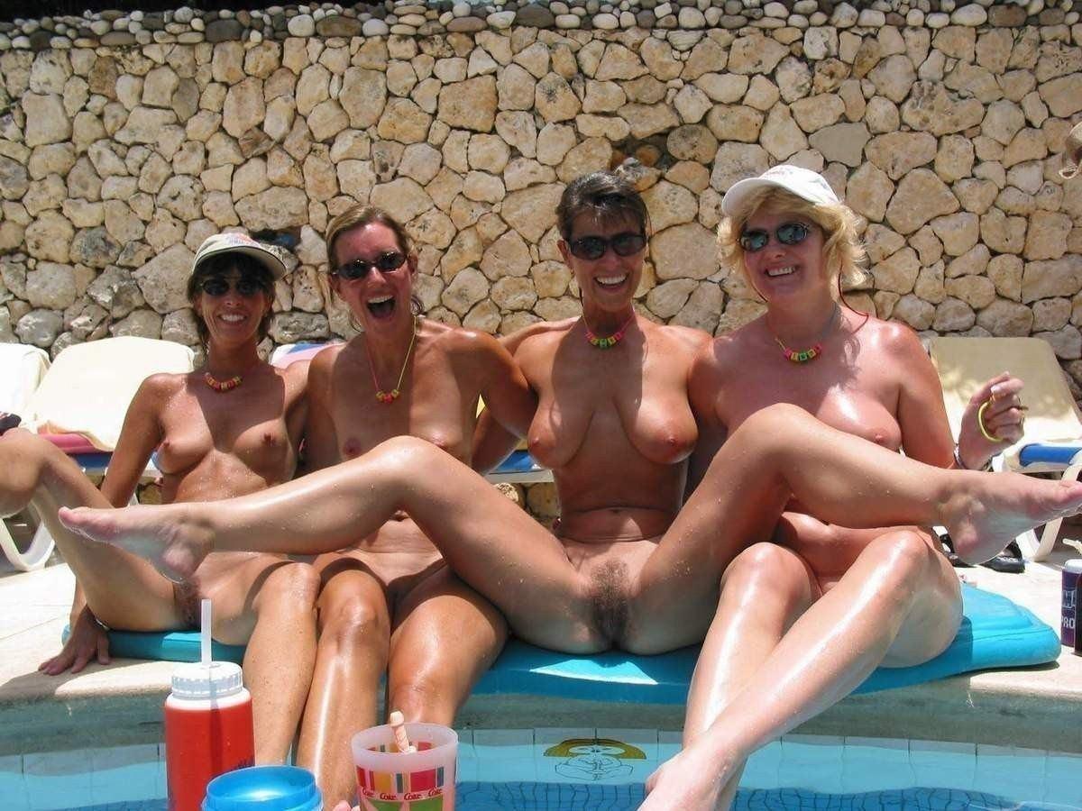 Mature topless on holiday